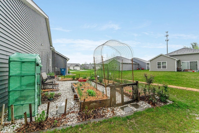7689 Accio Cv, Fort Wayne, IN 46835 - view of grassy yard featuring a garden