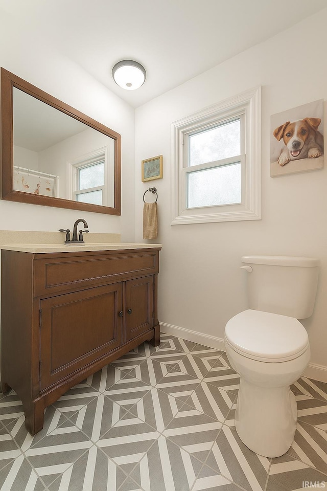 293 N 1100 E, Greentown, IN 46936 - full bathroom with plenty of natural light, baseboards, and vanity