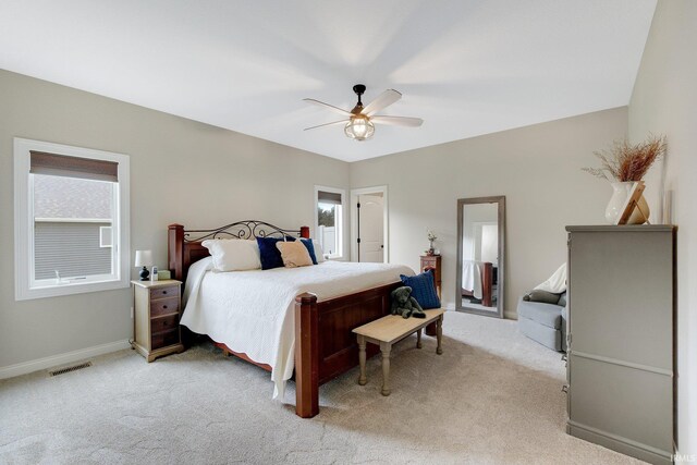 201 Thoroughbred Ln, Auburn, IN 46706 - bedroom featuring light colored carpet, baseboards, and ceiling fan