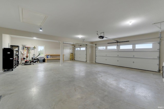 201 Thoroughbred Ln, Auburn, IN 46706 - garage featuring a garage door opener