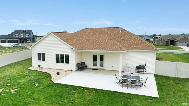 201 Thoroughbred Ln, Auburn, IN 46706 - rear view of property featuring french doors, a patio area, a shingled roof, and a residential view