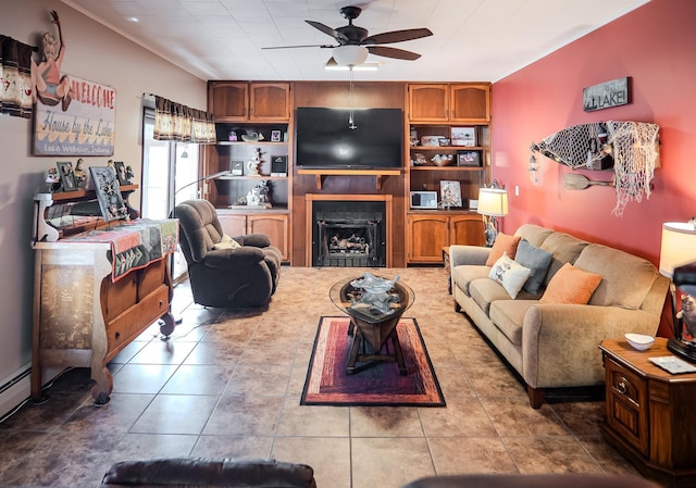 315 E Effie Mae St, North Webster, IN 46555 - tiled living area with a ceiling fan and a fireplace