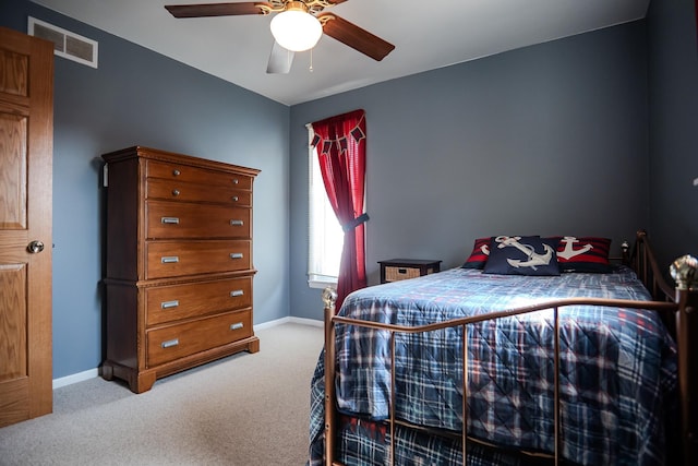 315 E Effie Mae St, North Webster, IN 46555 - bedroom featuring carpet floors, baseboards, and a ceiling fan