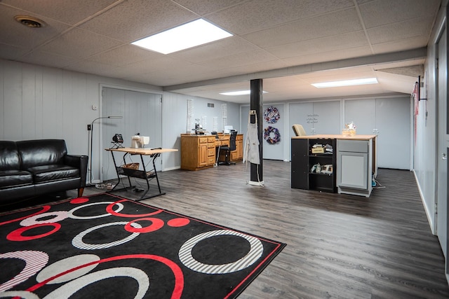 315 E Effie Mae St, North Webster, IN 46555 - living area with dark wood-type flooring, a drop ceiling, and bar area