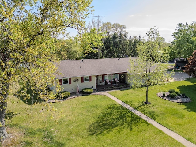 315 E Effie Mae St, North Webster, IN 46555 - view of front of home with a front yard and roof with shingles