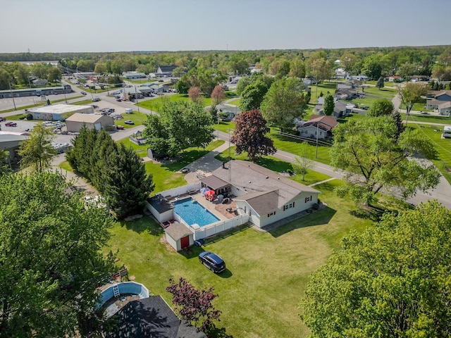315 E Effie Mae St, North Webster, IN 46555 - aerial view of residential area featuring a pool and a tree filled landscape