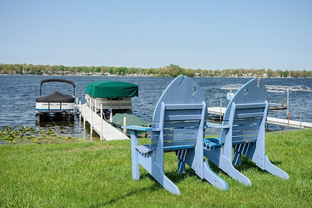 315 E Effie Mae St, North Webster, IN 46555 - dock area with a water view, a lawn, and boat lift