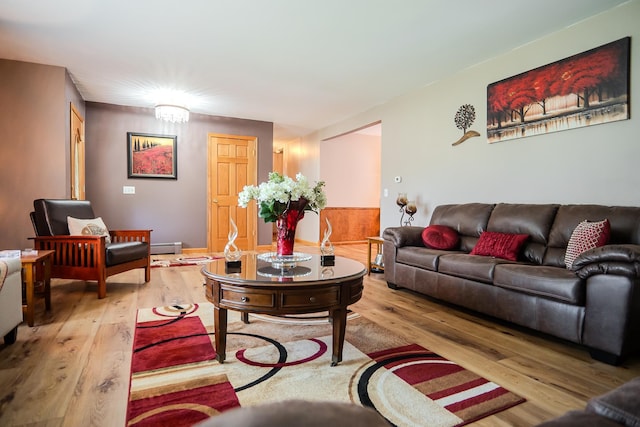315 E Effie Mae St, North Webster, IN 46555 - living area with hardwood / wood-style floors and a baseboard radiator