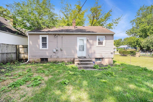 1714 S Warren St, South Bend, IN 46613 - rear view of property featuring a chimney