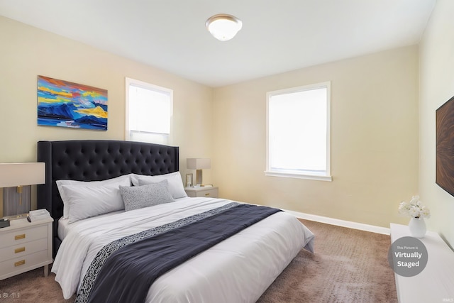 1714 S Warren St, South Bend, IN 46613 - carpeted bedroom featuring multiple windows and baseboards