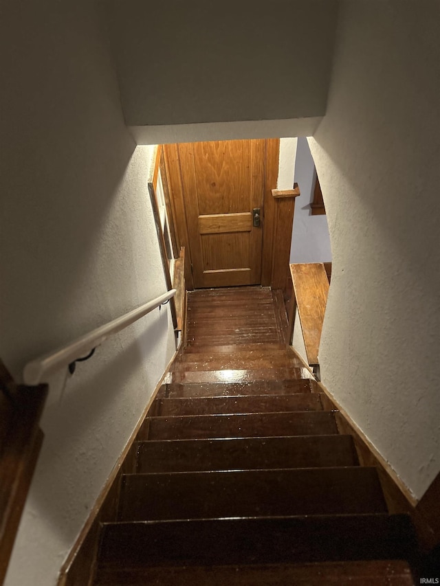 2931 Alexander St, Fort Wayne, IN 46806 - stairs with hardwood / wood-style floors and a textured wall