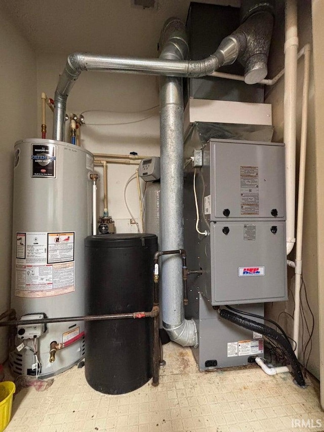 utility room with gas water heater