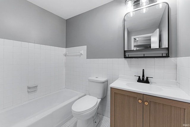2937 Westbrook Dr Unit A-314, Fort Wayne, IN 46805 - full bath featuring toilet, a tub, tile walls, vanity, and tile patterned flooring