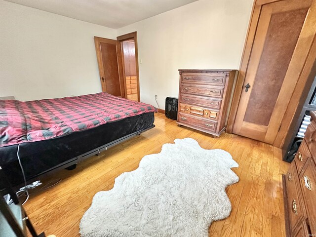 1655 Hinton Dr, Fort Wayne, IN 46808 - bedroom with light wood-style flooring