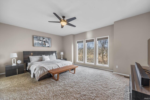 2344 E Linden Hill Dr, Bloomington, IN 47401 - bedroom with carpet flooring, baseboards, and a ceiling fan