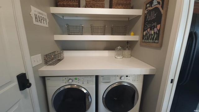 laundry room featuring washer and clothes dryer