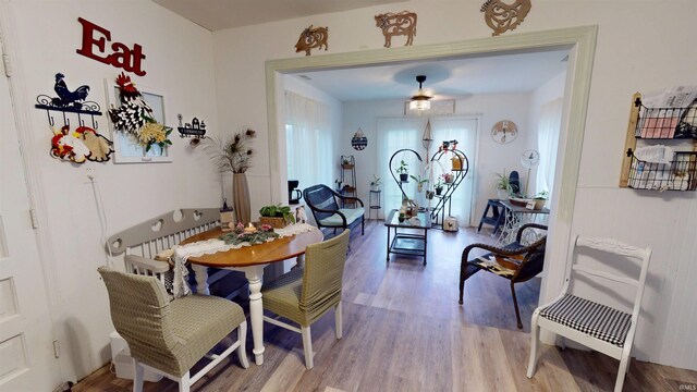 dining space featuring wood finished floors