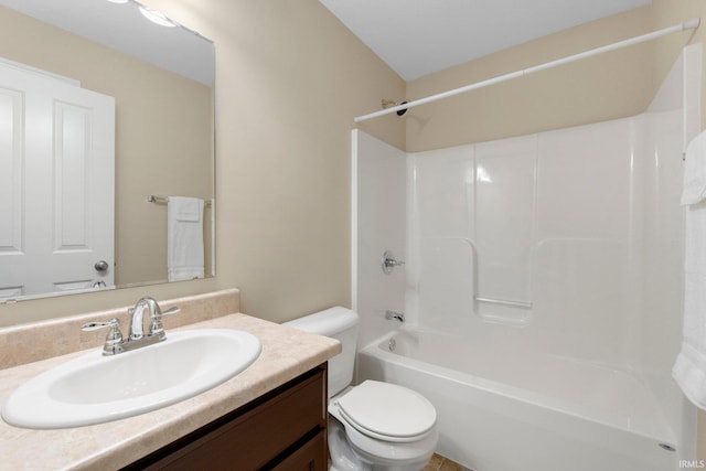 full bath featuring toilet, vanity, and shower / bathtub combination