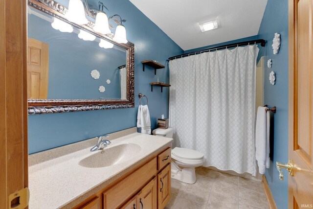 2102 Hunters Ct, Auburn, IN 46706 - bathroom with tile patterned flooring, toilet, vanity, and curtained shower