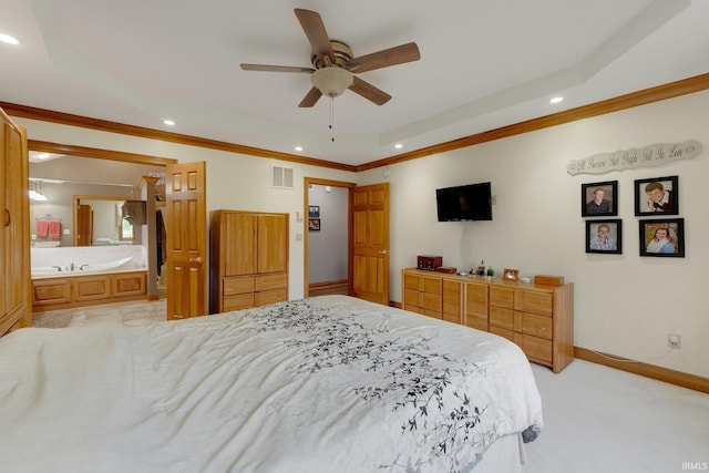 2102 Hunters Ct, Auburn, IN 46706 - bedroom featuring recessed lighting, ornamental molding, baseboards, ensuite bath, and light colored carpet