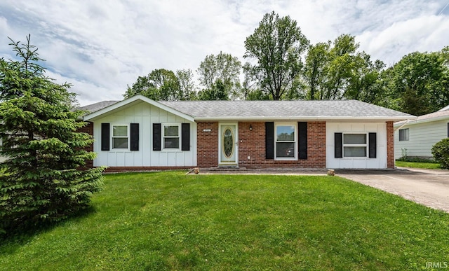 3721 W Maybury Mall, Bloomington, IN 47403 - single story home with board and batten siding, a front lawn, brick siding, and a shingled roof