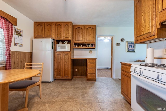 3721 W Maybury Mall, Bloomington, IN 47403 - kitchen featuring white appliances, brown cabinetry, a baseboard radiator, light countertops, and tasteful backsplash