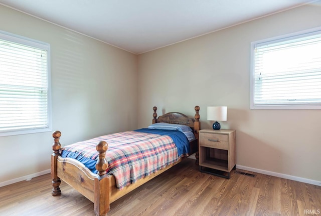 3721 W Maybury Mall, Bloomington, IN 47403 - bedroom with wood finished floors and baseboards