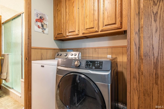 3721 W Maybury Mall, Bloomington, IN 47403 - laundry area with cabinet space, washing machine and dryer, wainscoting, and wood walls