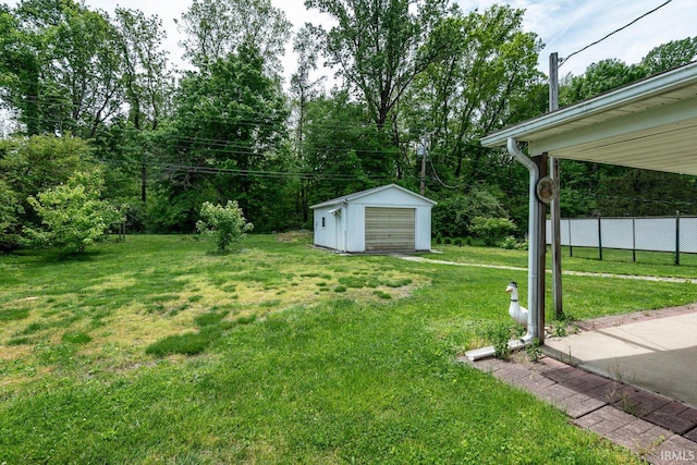 3721 W Maybury Mall, Bloomington, IN 47403 - view of yard with an outdoor structure, a storage shed, and a detached garage