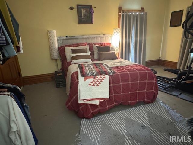 bedroom with baseboards