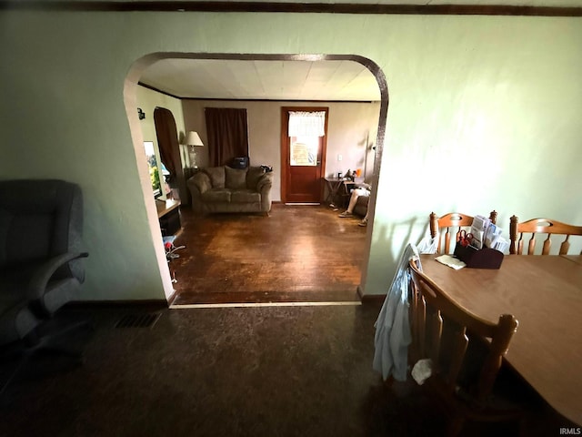 living area with arched walkways