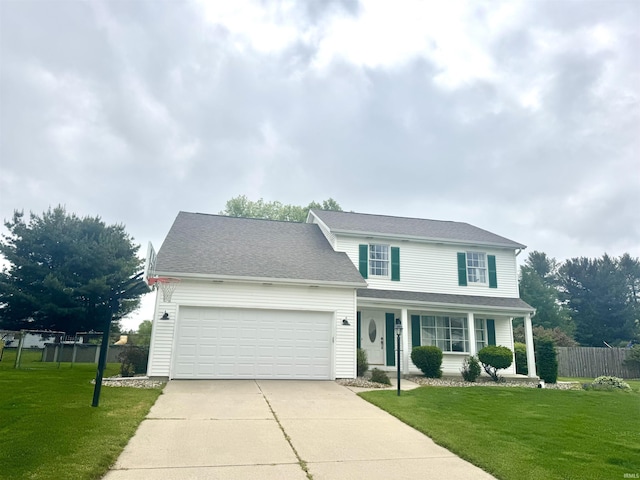 50880 Cherry Farm Trl, Granger, IN 46530 - traditional-style home featuring concrete driveway, a garage, and covered porch