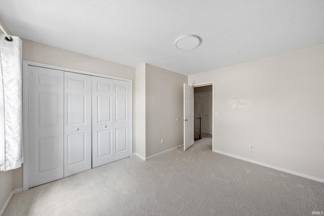 50880 Cherry Farm Trl, Granger, IN 46530 - unfurnished bedroom featuring carpet floors, baseboards, and a closet