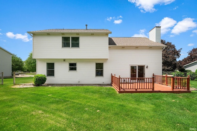 50880 Cherry Farm Trl, Granger, IN 46530 - rear view of house featuring a wooden deck, a lawn, and a chimney