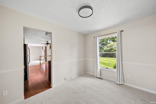 50880 Cherry Farm Trl, Granger, IN 46530 - empty room featuring carpet floors, ceiling fan, and baseboards