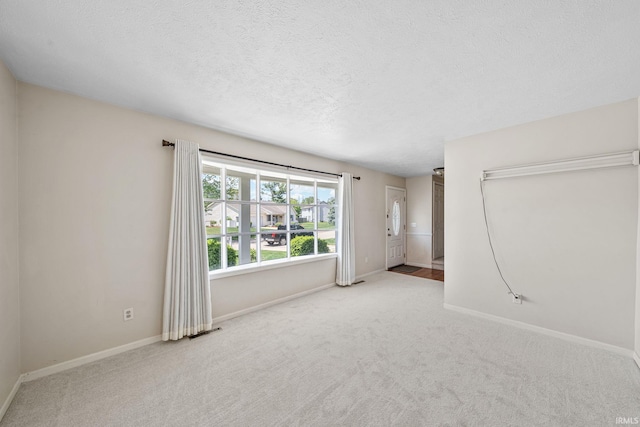 50880 Cherry Farm Trl, Granger, IN 46530 - carpeted empty room featuring baseboards and a textured ceiling