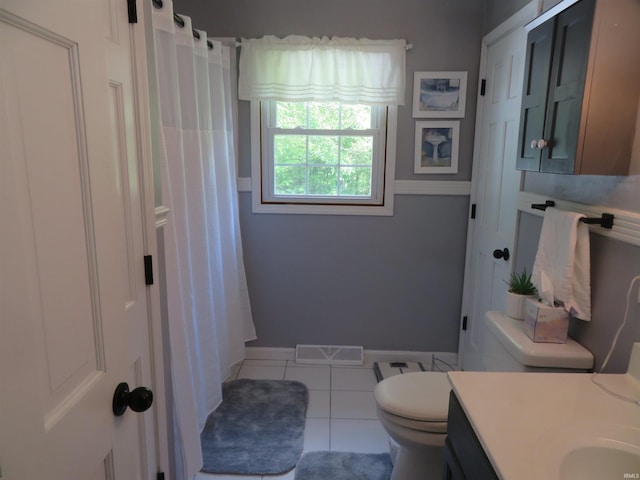 1243 Bellgrade Ave, Loogootee, IN 47553 - bathroom with toilet, tile patterned flooring, baseboards, vanity, and a shower with shower curtain