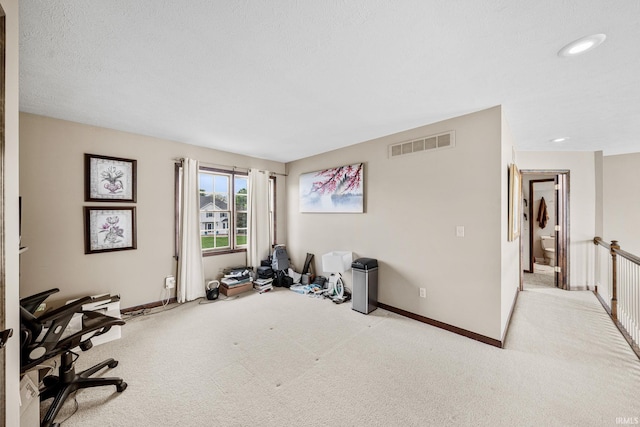spare room with carpet flooring, baseboards, and recessed lighting