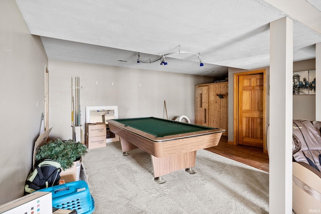 playroom featuring billiards, carpet, and a textured ceiling