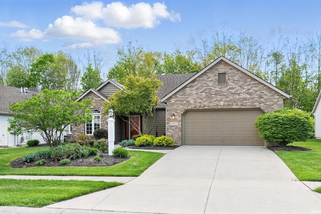 12908 Chaplin Ct, Fort Wayne, IN 46845 - view of front of home featuring brick siding, a garage, driveway, and a front yard