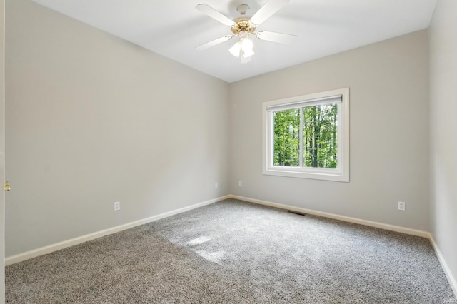 12908 Chaplin Ct, Fort Wayne, IN 46845 - spare room with carpet flooring, baseboards, and a ceiling fan
