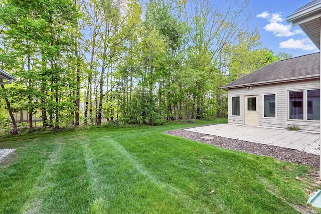 12908 Chaplin Ct, Fort Wayne, IN 46845 - view of grassy yard with a patio area