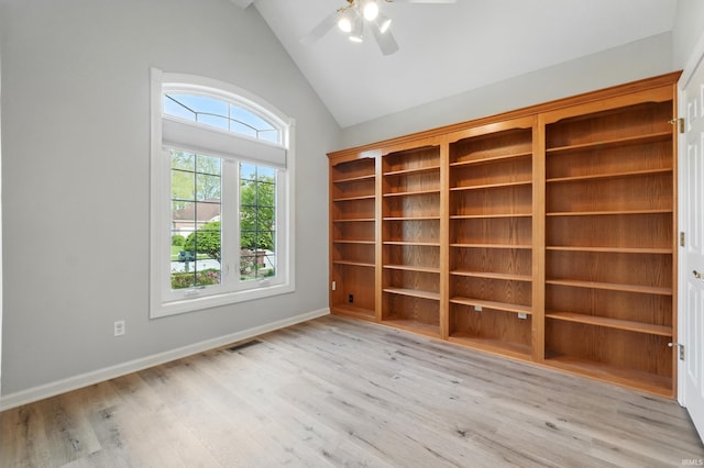 12908 Chaplin Ct, Fort Wayne, IN 46845 - spare room featuring light wood-style flooring, ceiling fan, baseboards, and high vaulted ceiling