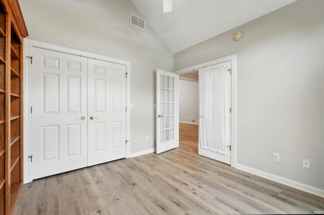 12908 Chaplin Ct, Fort Wayne, IN 46845 - unfurnished bedroom featuring wood finished floors, a closet, baseboards, ceiling fan, and high vaulted ceiling