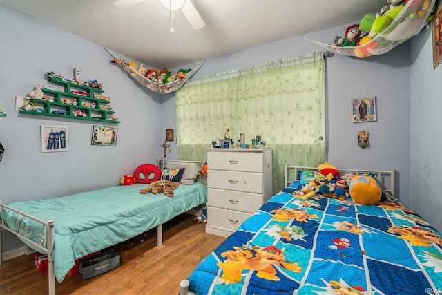 56635 N Wedgewood Ave, Elkhart, IN 46516 - bedroom featuring wood finished floors and a ceiling fan
