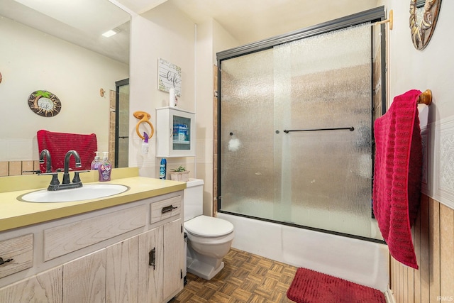 56635 N Wedgewood Ave, Elkhart, IN 46516 - bathroom featuring toilet, bath / shower combo with glass door, and vanity