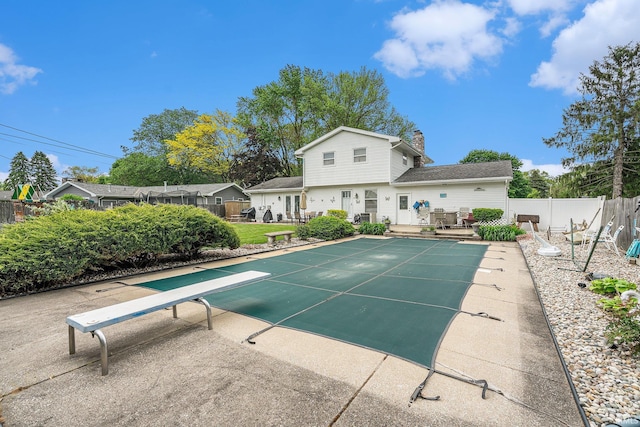 56635 N Wedgewood Ave, Elkhart, IN 46516 - view of pool with fence and a diving board
