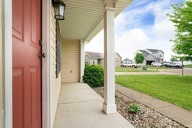 view of patio featuring a residential view and a porch