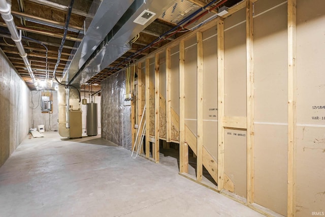 unfinished below grade area with gas water heater and heating unit