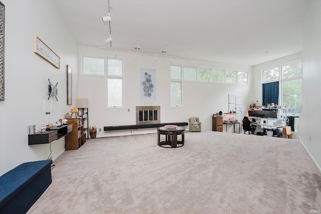 4207 Lance Ct, Kokomo, IN 46902 - carpeted living room with a desk and baseboards